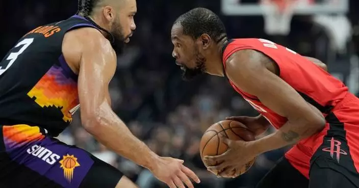 Kevin Durant scores 24 in his return to Phoenix, leads the Rockets past the Suns 119-105