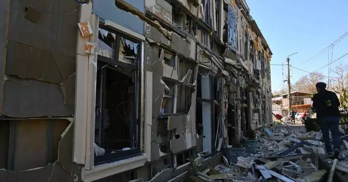 A predawn Russian drone strike hits Ukraine’s Odesa, wounding 14; 2 killed in Russian-held Kherson