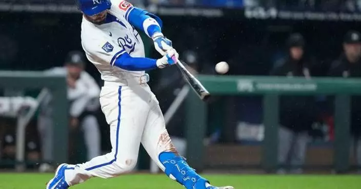 Jonathan India hits grand slam and Kyle Isbel goes 4 for 4 as Royals outslug Twins 13-9 in rain