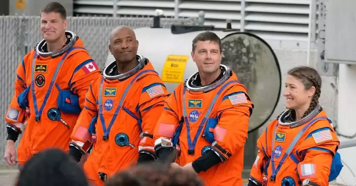 The Latest: Artemis II astronauts reach orbit on historic mission to the moon and back