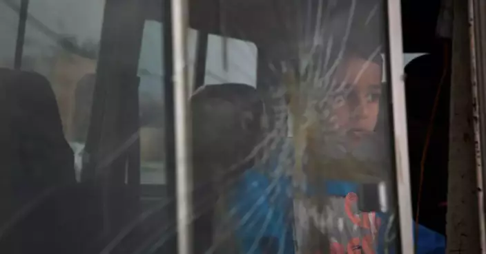 The Latest: Iran launches missiles at Israel and Gulf states as explosions heard around Tehran