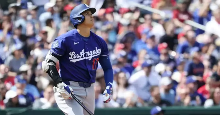 Ohtani and Tucker hit 2 of the Dodgers' 5 homers in a 13-6 rout of the Nationals