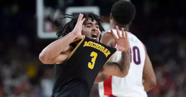Michigan overpowers Arizona and reaches national title game with 91-73 win