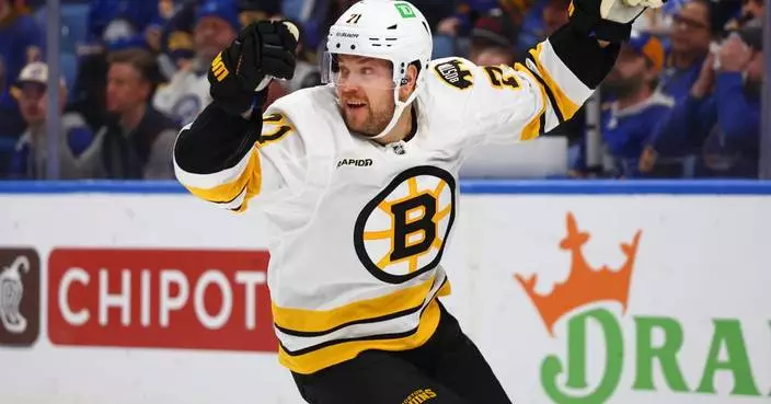 Arvidsson scores 2 and the Bruins beat the Sabres 4-2 to even first-round series at 1