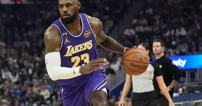 LeBron James has 26 points, 11 assists to lead Lakers past Warriors 119-103 as Stephen Curry sits