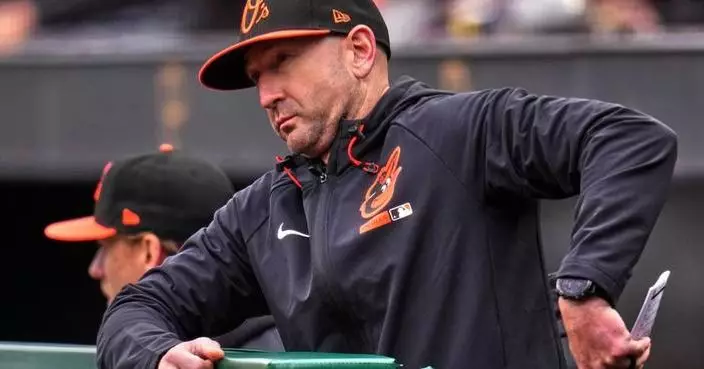 Orioles manager Craig Albernaz is OK after taking a line drive off his face