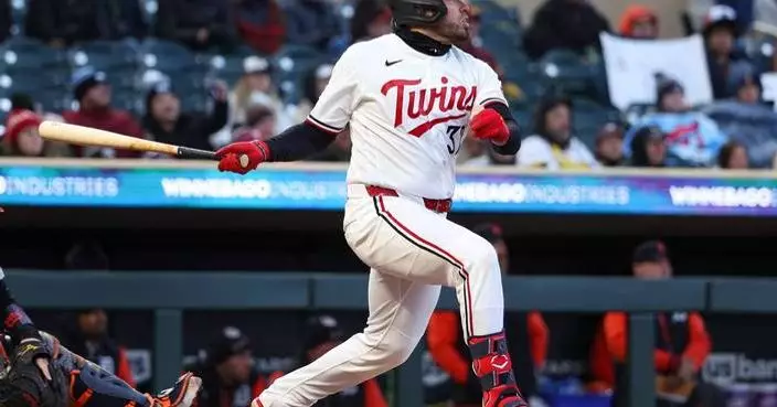 Keaschall hits a 2-run homer and the Twins hold on for a frigid 7-3 win over the Tigers