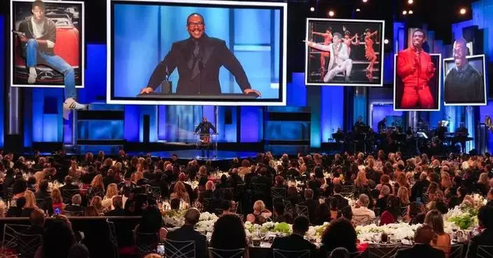 Eddie Murphy receives life achievement award by AFI, drawing standing ovation at star-filled tribute
