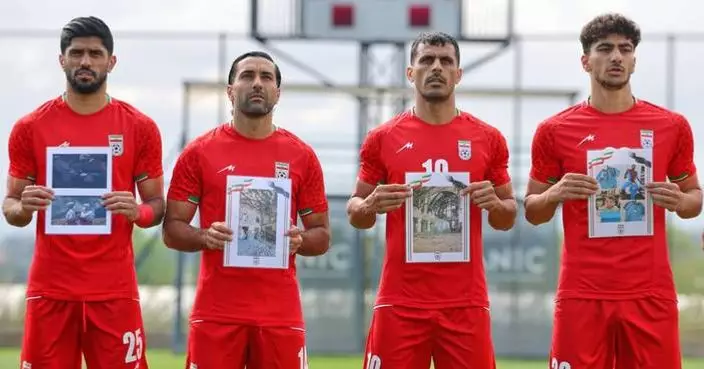 Iran soccer players meet FIFA head Infantino before World Cup warmup and honor child victims of war