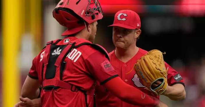 Lowe’s 3-run double in 1st sparks Reds to 7-3 with over Angels as LA manager Kurt Suzuki ejected