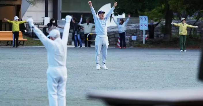 Japan awakens to Radio Taiso exercise tradition. One face of the country’s longevity