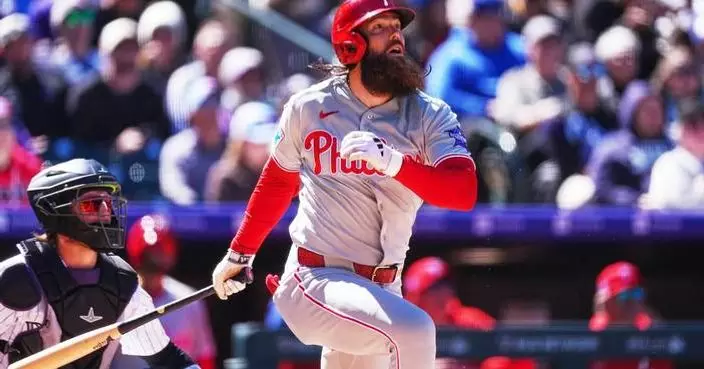 Marsh helps power 7-run first inning as Phillies beat Rockies 10-1 in Colorado’s home opener