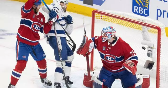 Hagel scores twice in 3rd, Lightning beat Canadiens 3-2 in Game 4 to tie series