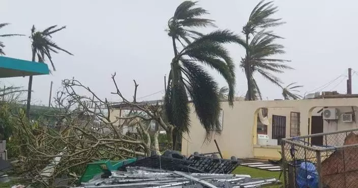 Typhoon flipped over cars and ripped away roofs on US islands in the Pacific Ocean