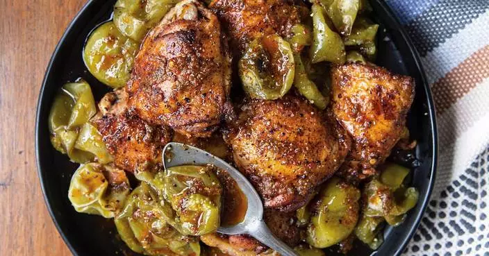 A tangy dressing flavors this recipe for Mex-Italian Chicken Thighs with Roasted Tomatillos