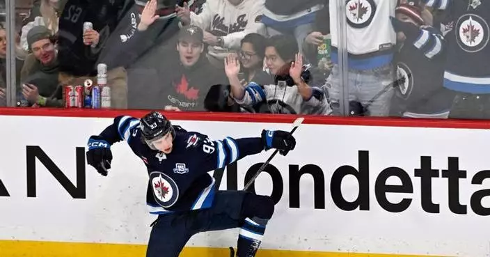 Kyle Connor scores twice and Jets roll past Kraken 6-2