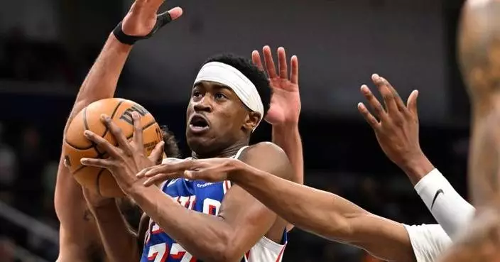 Paul George has 23 points to lead the 76ers past the Timberwolves, 115-103