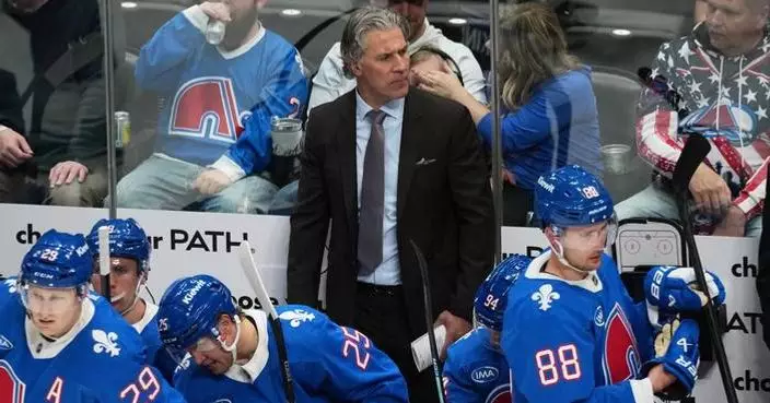 Avs coach Jared Bednar taken to hospital after being hit in his face with a puck