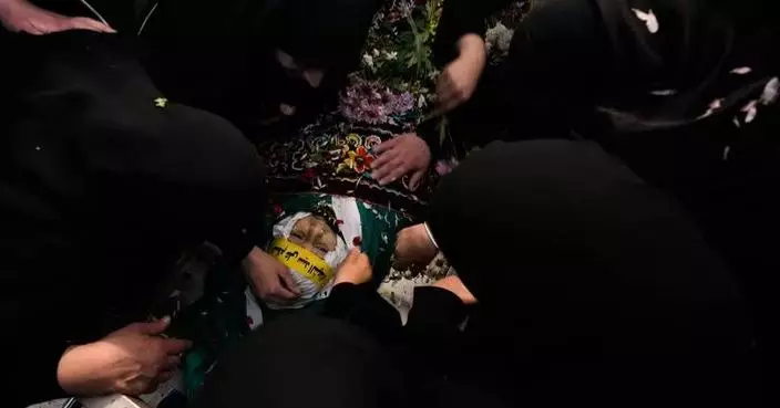 Photos show funerals in Lebanon for Hezbollah fighters, civilians killed before ceasefire