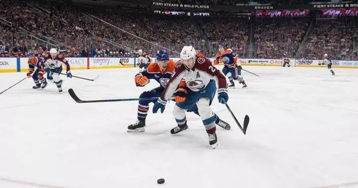 MacKinnon’s all-business season means leading NHL in goals, Hart Trophy chase and occasional smile