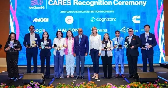 Minister K Shanmugam Presents AmCham CARES Awards to companies at the AmChamSG 53rd Annual General Meeting and Social Impact Fair