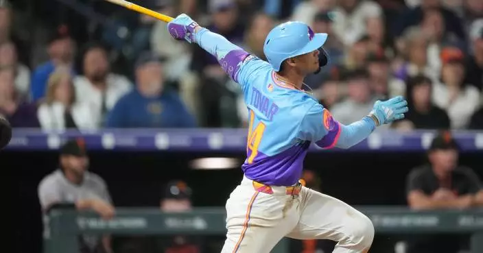 Tovar, Goodman homer in 5-run 9th, Rockies beat Giants 8-6