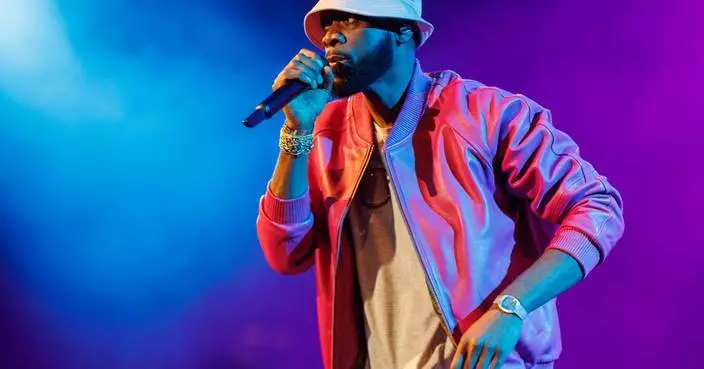 Fugees rapper Pras reports to prison to begin 14-year sentence
