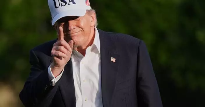 The Latest: World shares and oil prices react to Trump’s warning to Tehran over stalled negotiations