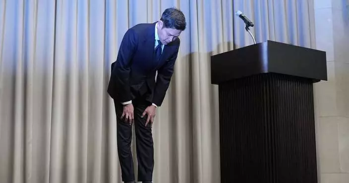 South Korean Starbucks boss apologizes for ad campaign that evoked massacre