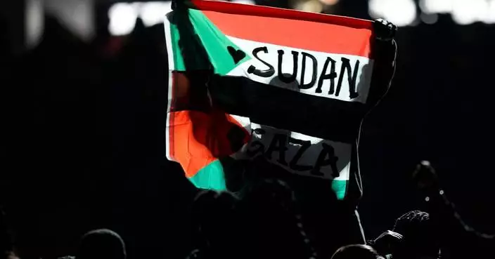 Super Bowl halftime performer who ran with protest flag found guilty of resisting an officer