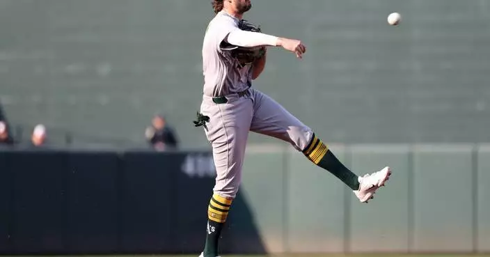 Athletics shortstop Jacob Wilson leaves game with a shoulder injury after diving for a grounder