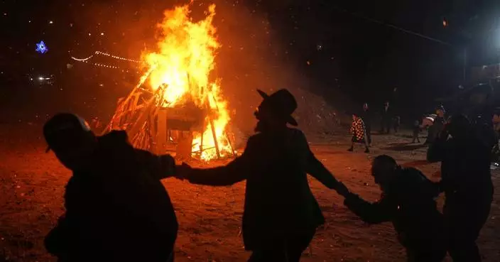 Jewish holiday Lag BaOmer lights up Israel with bonfires and song, in photos