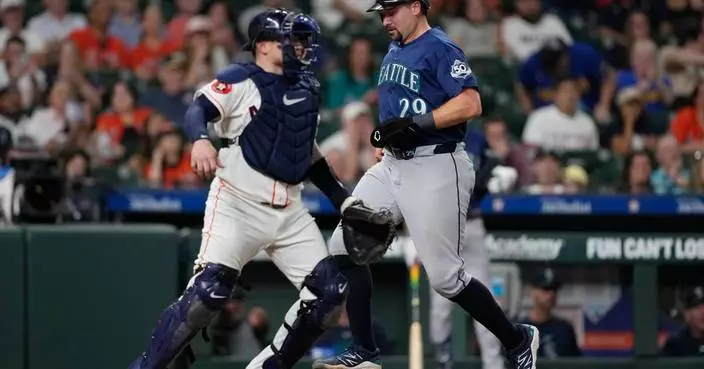 Cal Raleigh tried a full-uniform shower. The next night, his bat finally woke up
