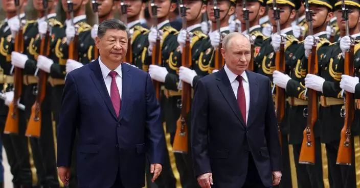 Xi and Putin highlight their friendship and cooperation on energy and other issues in Beijing visit