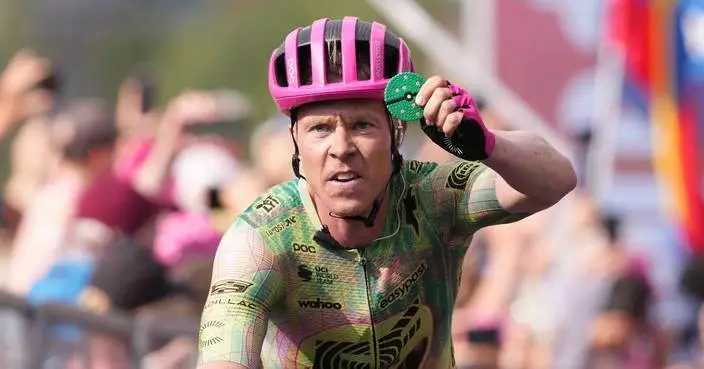 Vingegaard keeps overall lead as Valgren wins Giro stage and celebrates with son’s lucky charm