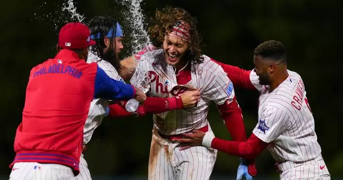 Schwarber delivers as Phillies rally again to beat Giants 6-5 in 10 innings for doubleheader sweep