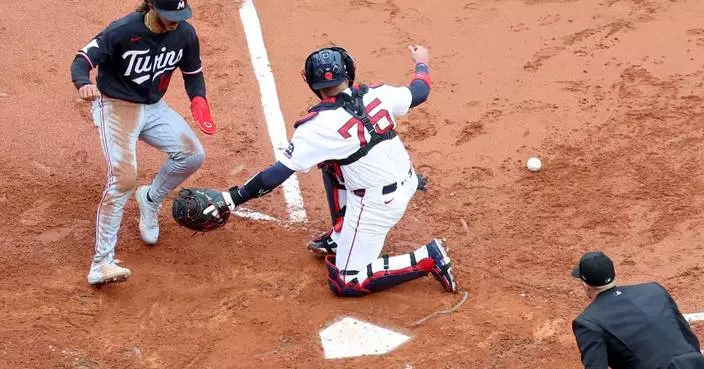 Twins complete three-game sweep over Red Sox with 6-5 win at soggy Fenway Park