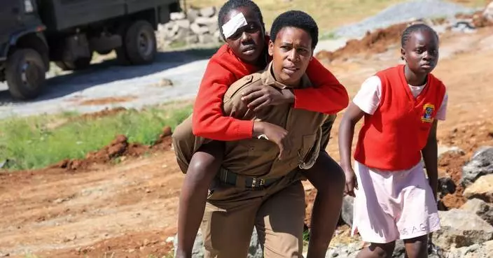 Fire rips through a dormitory at a girls' school in Kenya, killing at least 16 students