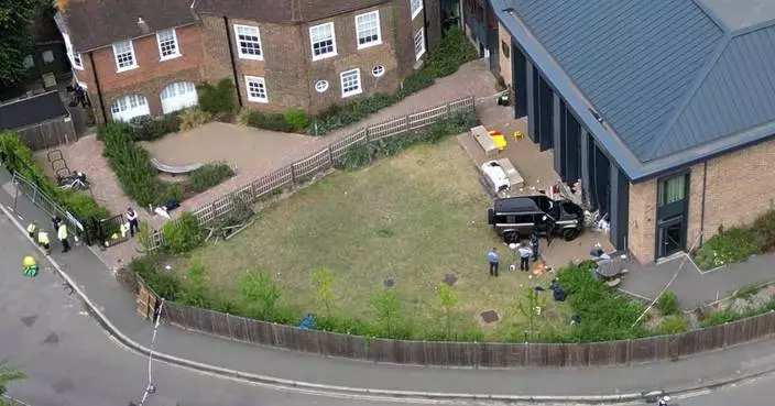 Driver who drove into a tea party outside a London school charged over death of 2 girls