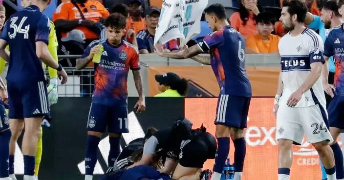 Dynamo defender Diadie Samassekou taken off field in ambulance with apparent head injury