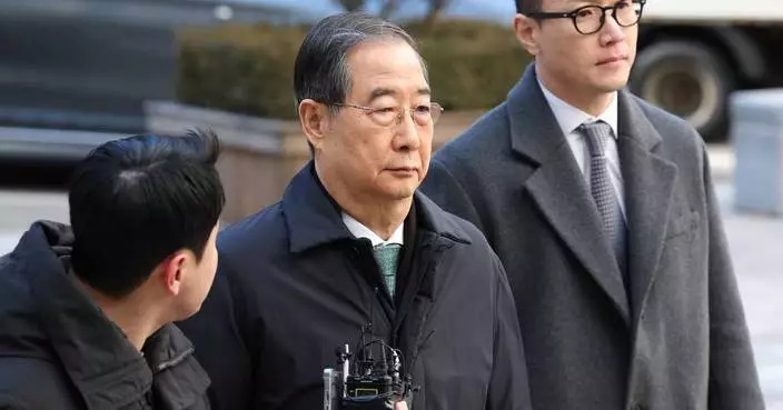 South Korean court reduces prison sentence for ex-prime minister in martial law case