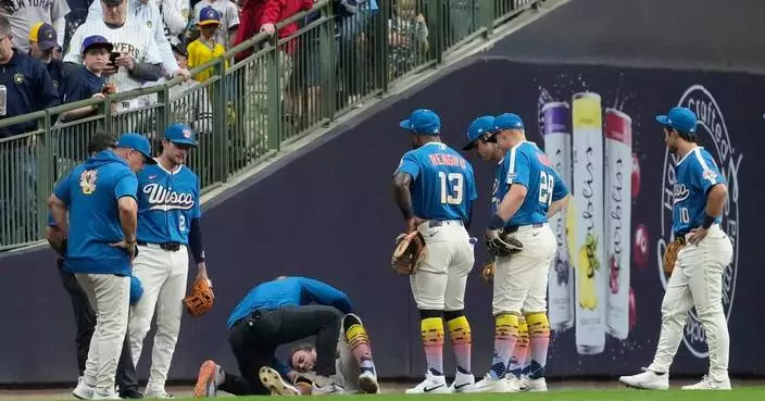 Brewers outfielder Brandon Lockridge carted off field after crashing into wall chasing foul ball