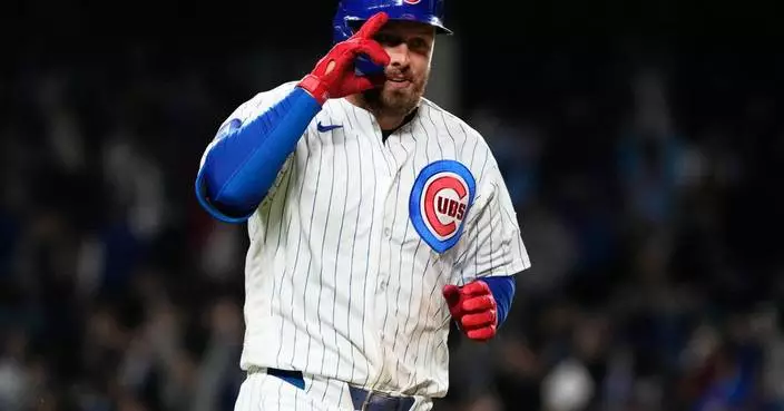 Busch hits RBI single in 10th as Cubs beat Reds 3-2 for seventh straight win