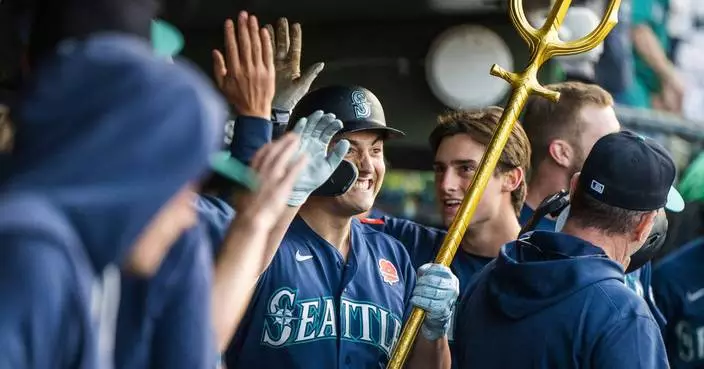 Mariners slug 4 homers in their 9-2 victory over the Athletics