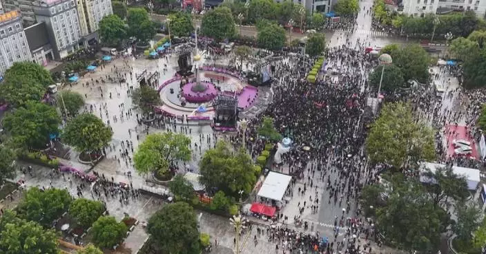 Folk event ‘daubing your face black’ held in Yunnan