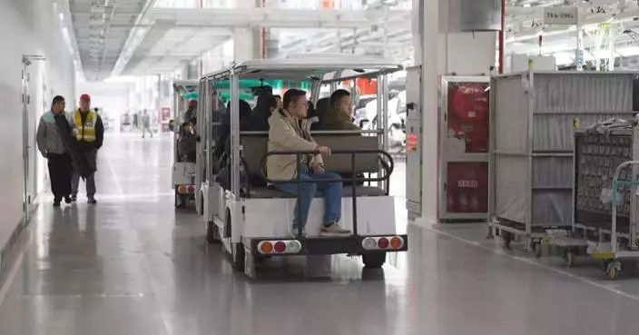 China’s smart auto plant becomes tourism hotspot