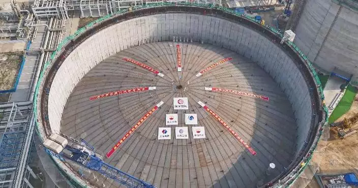 821-ton LNG tank dome lifted into place in Hainan