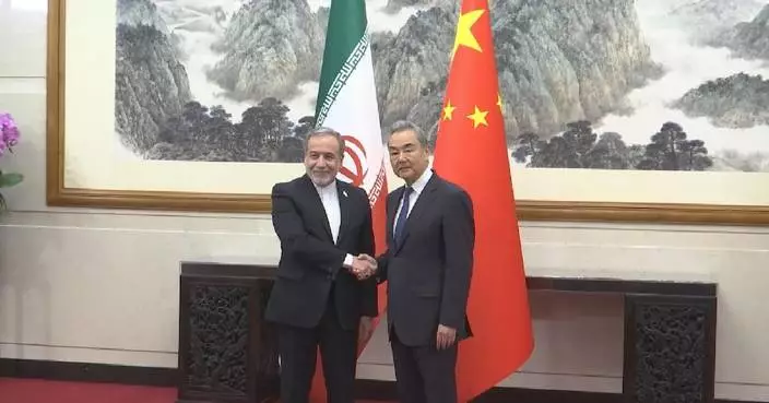 Chinese FM holds talks with Iranian counterpart