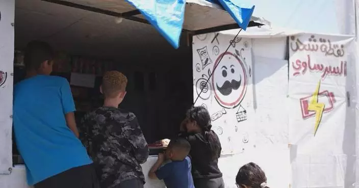 Tent fitted with solar panels provides lifeline to Gaza residents amid power outages