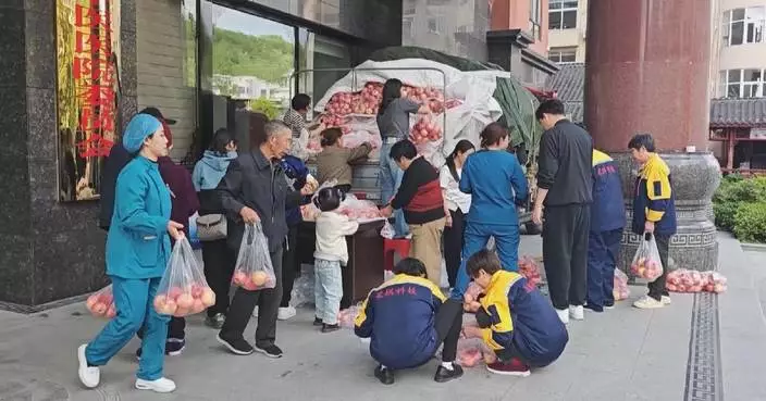 Compassionate locals spring into action to buy up truckload of apples after driver hospitalized
